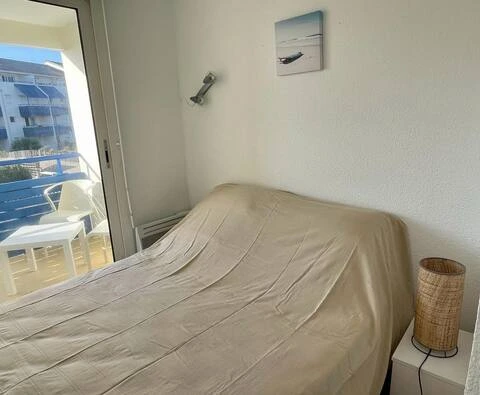 alt="Appartement Lacanau Océan – Chambre principale avec lit double"
