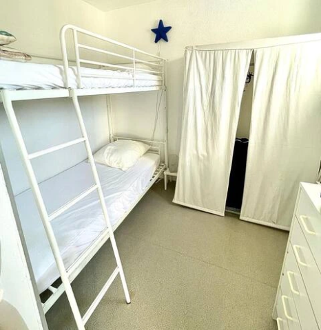 alt="Appartement Lacanau Océan – Chambre enfants avec lits superposés"